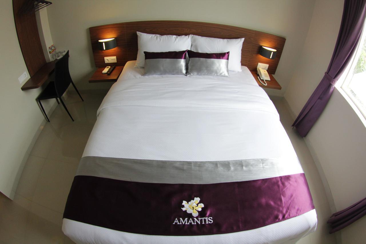 Amantis Hotel Demak Phòng bức ảnh